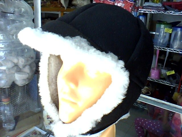 gorro del chavo en terminado repelente negro pelo gris.